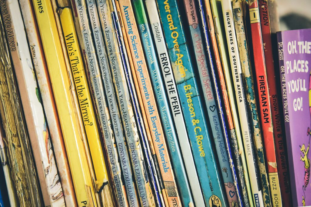 Shelf of many kids' books